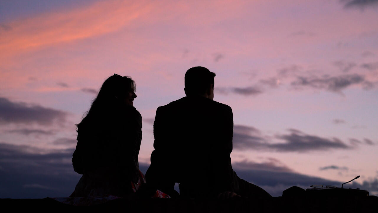 Sonnenuntergang, Silhouette eines Pärchens